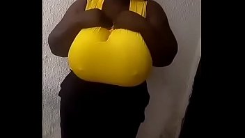 Huge breasted African girl dancing