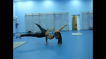 Sexy strong and flexible girl in a gym - More  