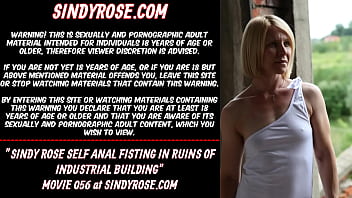 Sindy Rose self anal fisting in the ruins of industral building